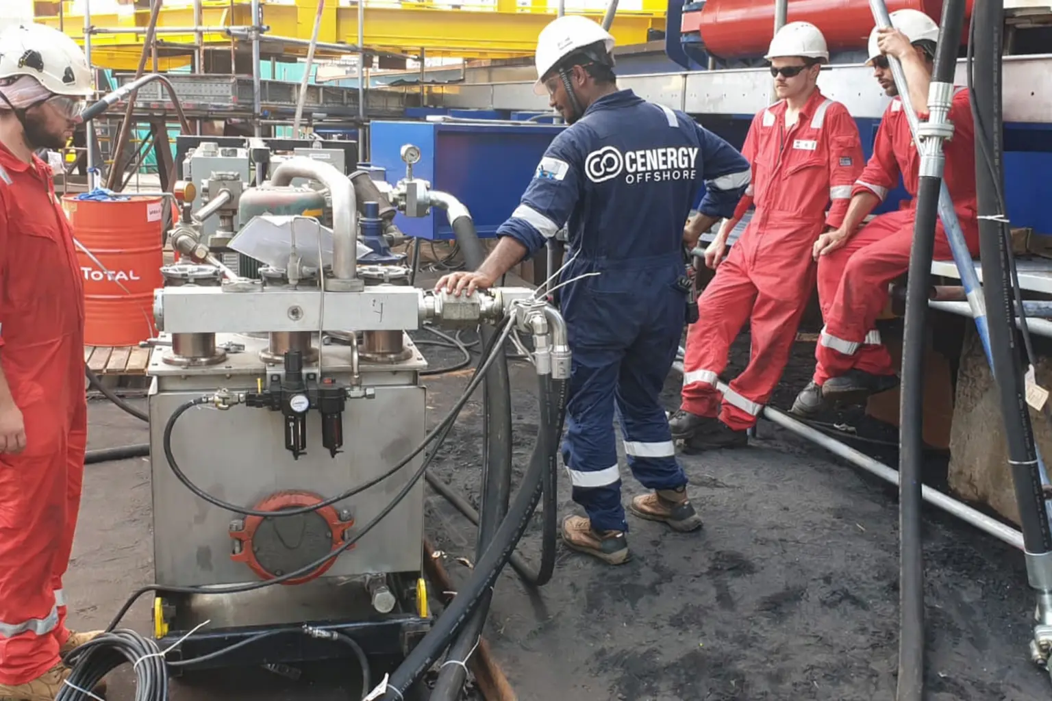 Cenergy Offshore personnel observing the flushing machine during pipe system flushing operation