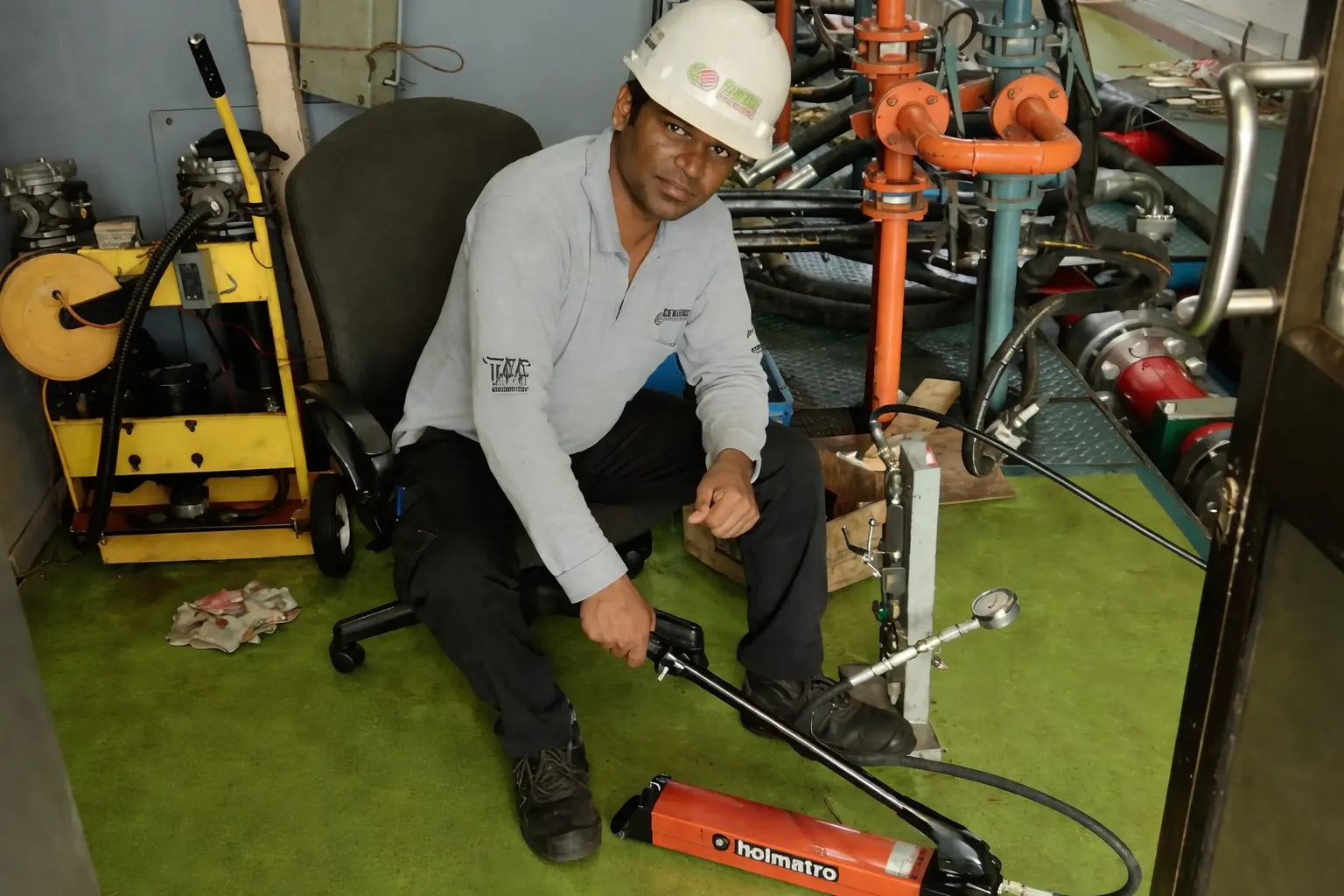 Cenergy Offshore technician performing pressure testing