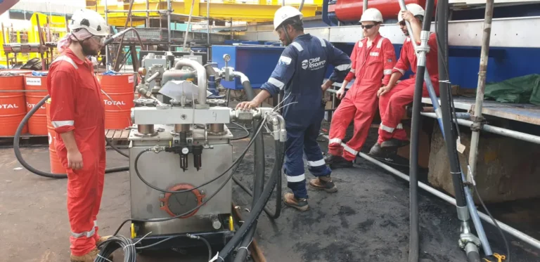 Chase Resource Technician performing hot oil flushing